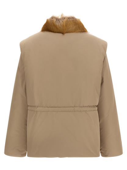 Jacket by Moncler for women in polyester beige & signature features a smart silhouette, perfectly accentuated by its unique high-neck neckline and functional insulated for a smart finish.