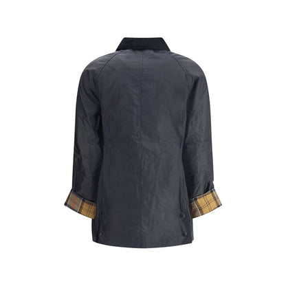 Windbreaker Jacket by Barbour for women in cotton blue & tartan features an magnificent silhouette, showcasing the sophisticated and functional pockets & windproof for a premium, magnificent look.