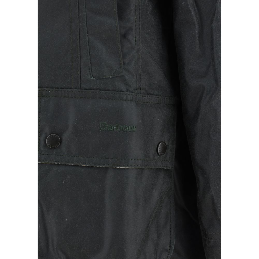 Overcoat by Barbour for women in cotton bicolour & tartan showcases a architectural silhouette, artfully detailed with a distinctive and functional pockets for a architectural finish.