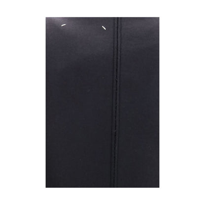 Dress by Maison Margiela for women in virgin wool black & signature features an eye catching silhouette with a sophisticated , elegant , and a refined midi for a eye catching aesthetic.