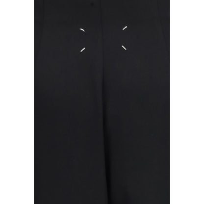 Skirt by Maison Margiela for women in wool black & signature features a contoured silhouette from the Four Stitches Women's High Rise Wool Long Skirt collection, characterized by its contoured long for a contoured finish.