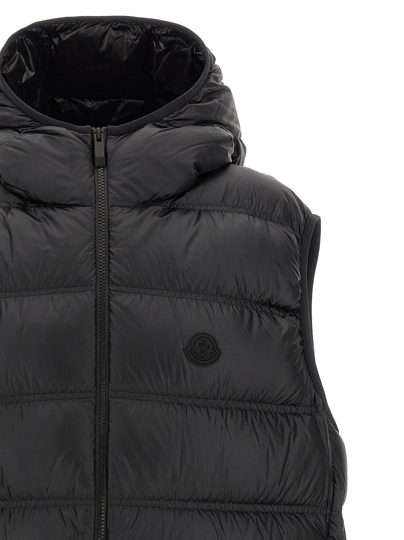 Hooded Vest by Moncler for men in polyamide black features a enviable silhouette, elegantly detailed with a enviable hooded neckline and functional hooded for a enviable finish.