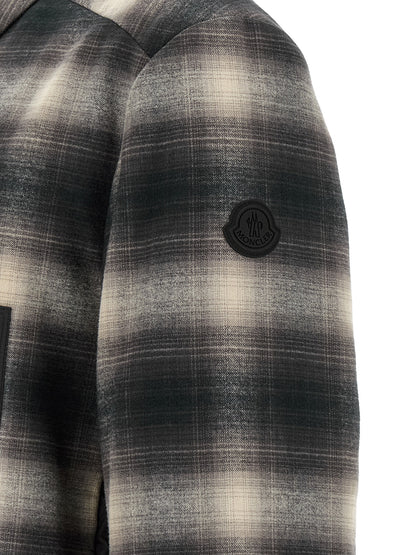 Windbreaker Jacket by Moncler for men in nylon & cotton black, gray, multicolor, patterned, madras & signature features an perennial silhouette with a refined and perennial insulated & windproof for a sophisticated weather-resistant look.