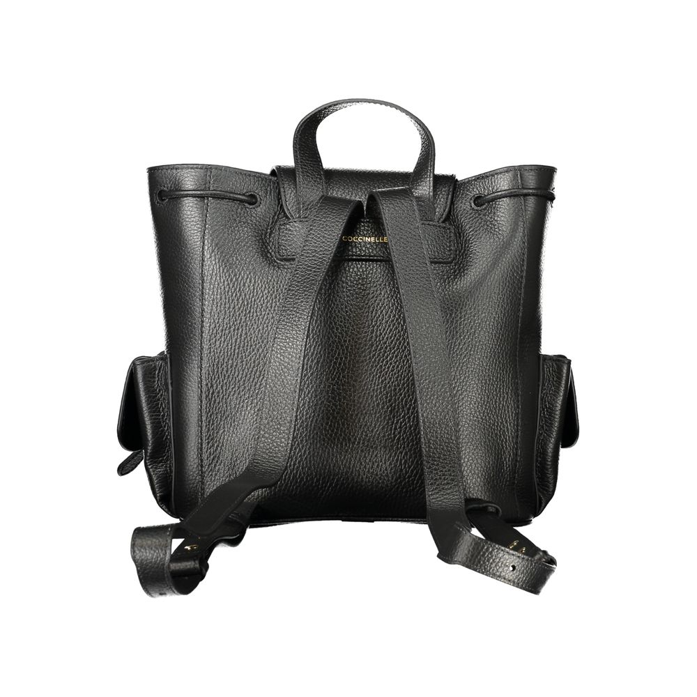 Drawstring Backpack by Coccinelle for women in leather black showcases an architectural Mavery Leather Drawstring Backpack design, featuring a secure drawstring & magnetic, ample built-in-compartments, external-pockets & internal-pockets, and architectural handle, backpack-strap & adjustable-strap for a sophisticated look.