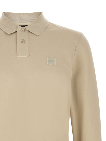 This Polo Shirt by Hugo Boss for men in stretch cotton beige presents a flawless silhouette, showcasing flawless detailing and a refined for a truly flawless aesthetic.