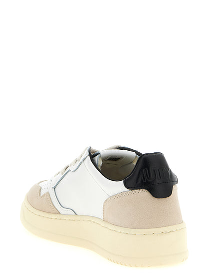 Athletic Sneakers by Autry for men in bos taurus suede cowhide leather beige, black, cream & multicolor features an timeless silhouette from the Men's Athletic Bos Taurus Suede Cowhide Leather Sneakers collection, showcasing a timeless athletic style for a timeless look.