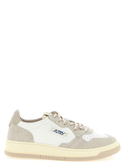 Sneakers by Autry for men in bos taurus suede cowhide leather cream, gray, light-grey, white & signature features an timeless silhouette from the Essence Men's Low Top Tennis Bos Taurus Suede Cowhide Leather Sneakers collection, showcasing a signature low-top tennis style with an timeless finish.