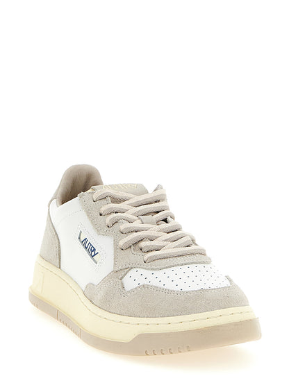 Sneakers by Autry for men in bos taurus suede cowhide leather cream, gray, light-grey, white & signature features an timeless silhouette from the Essence Men's Low Top Tennis Bos Taurus Suede Cowhide Leather Sneakers collection, showcasing a signature low-top tennis style with an timeless finish.