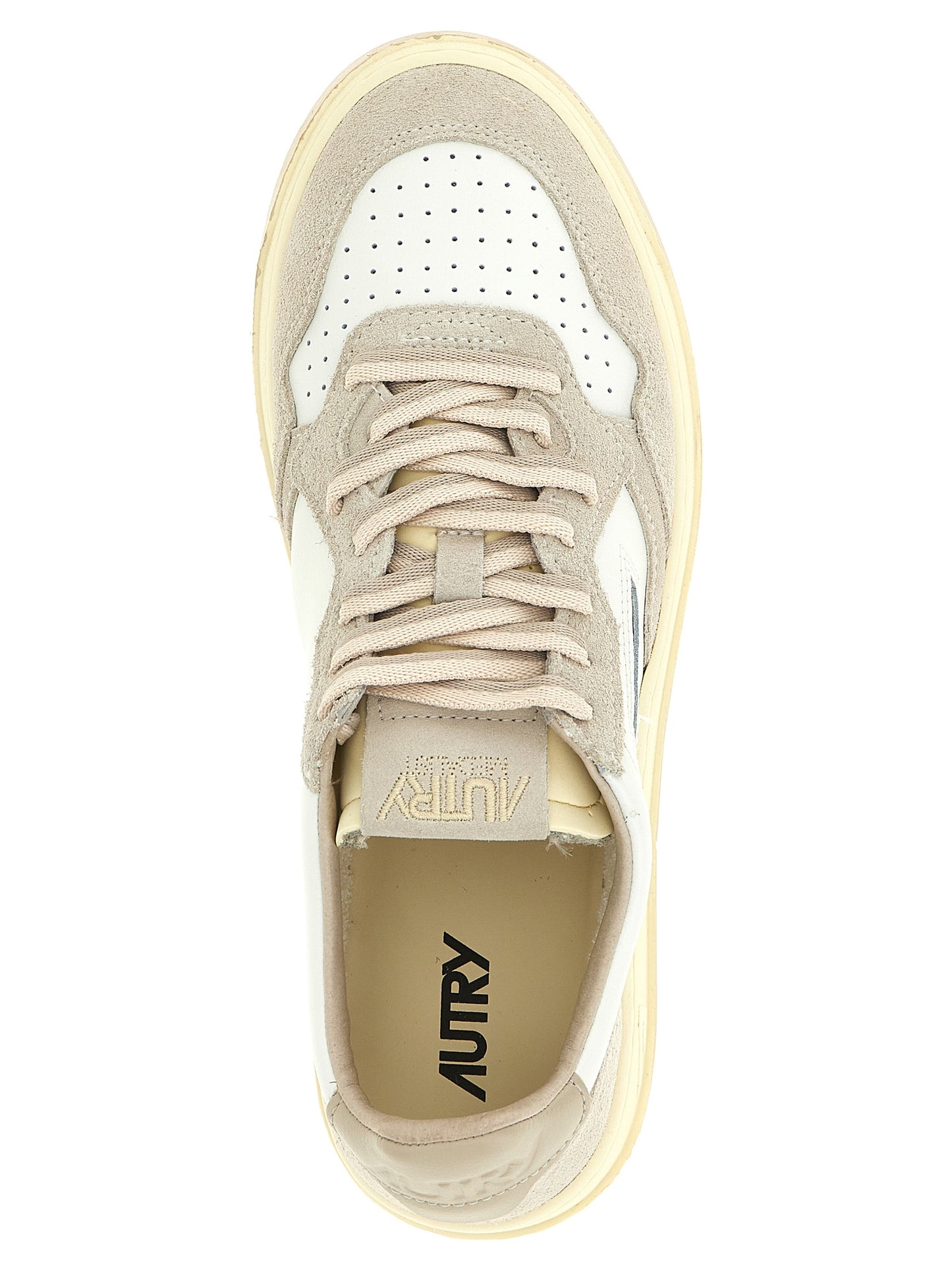 Sneakers by Autry for men in bos taurus suede cowhide leather cream, gray, light-grey, white & signature presents a impeccable silhouette as Essence Men's Low Top Tennis Bos Taurus Suede Cowhide Leather Sneakers, expertly defined by a impeccable low-top tennis style for a impeccable, high-fashion look.