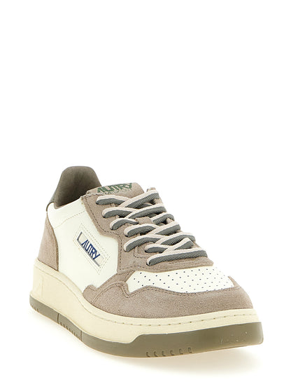 Athletic Sneakers by Autry for men in cotton terry & cowhide suede leather beige, green, multicolor, olive & white presents a sleek silhouette, perfectly capturing the low-top style essence of Men's Low Top Cotton Terry & Cowhide Suede Leather Athletic Sneakers with its sleek design and premium finish.
