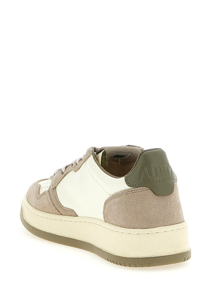 Athletic Sneakers by Autry for men in cotton terry & cowhide suede leather beige, green, multicolor, olive & white showcases an impeccable silhouette, defined by an impeccable low-top style design that perfectly captures the essence of the Men's Low Top Cotton Terry & Cowhide Suede Leather Athletic Sneakers.