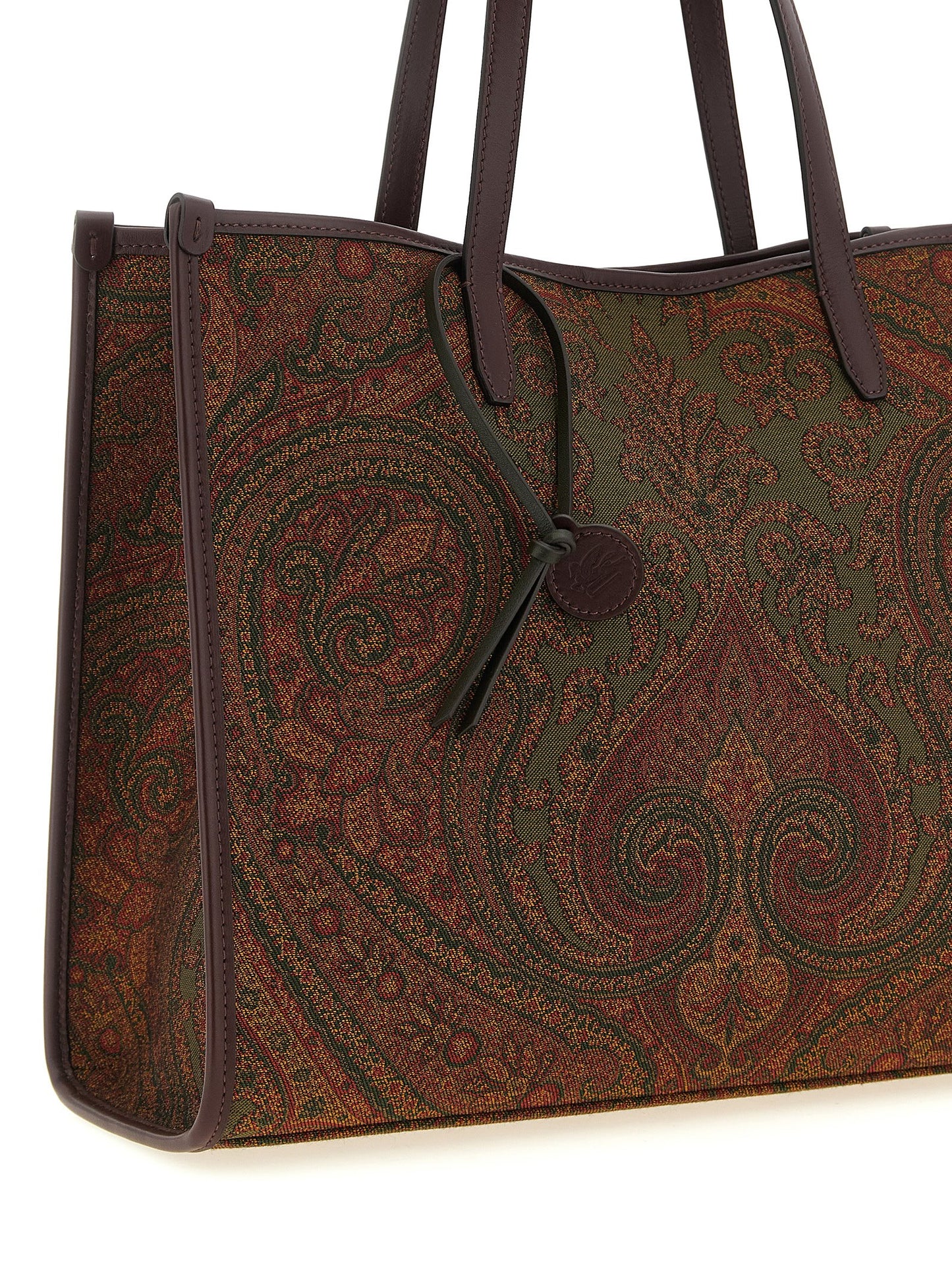 Large Shopper Tote Bag by Etro for women in polyester leather multicolor, paisley, jacquard & striped features an metropolitan chic Pegaso Polyester Leather Large Shopper Tote Bag design with a secure zipper & magnetic, metropolitan chic , and versatile handle for a metropolitan chic look.