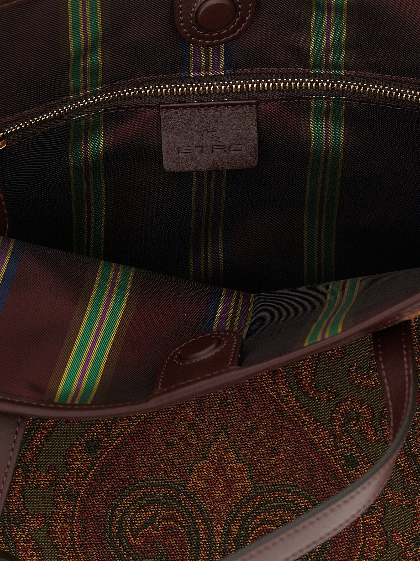 This Large Shopper Tote Bag by Etro for women in polyester leather multicolor, paisley, jacquard & striped features an on trend Pegaso Polyester Leather Large Shopper Tote Bag design with a secure zipper & magnetic, ample , and on trend handle.