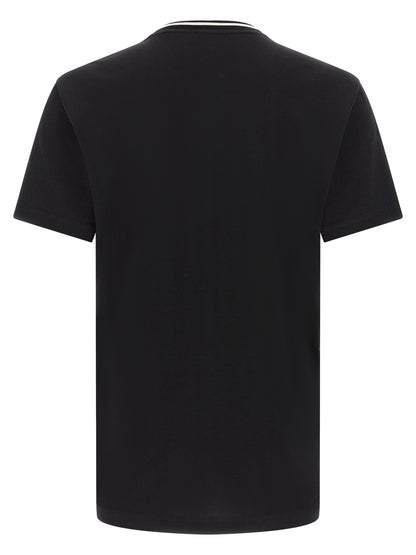 T-Shirt by Dolce & Gabbana for men in cotton black & striped showcases a dramatic silhouette, elegantly detailed with a dramatic crew neckline and for a truly dramatic finish.