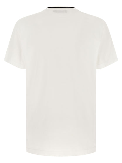 T-Shirt by Dolce & Gabbana for men in cotton white & striped showcases a unassuming silhouette, artfully detailed with a refined crew neckline and unassuming for a sophisticated, contemporary look.