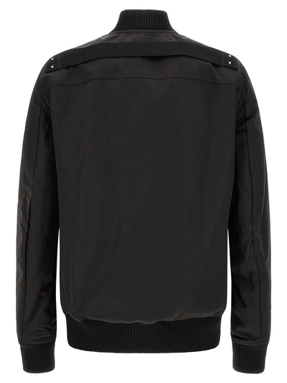 This Bomber Jacket by Rick Owens for men in nylon & cotton black & silver exhibits a edgy silhouette, meticulously detailed with functional pockets and a edgy for a edgy finish.