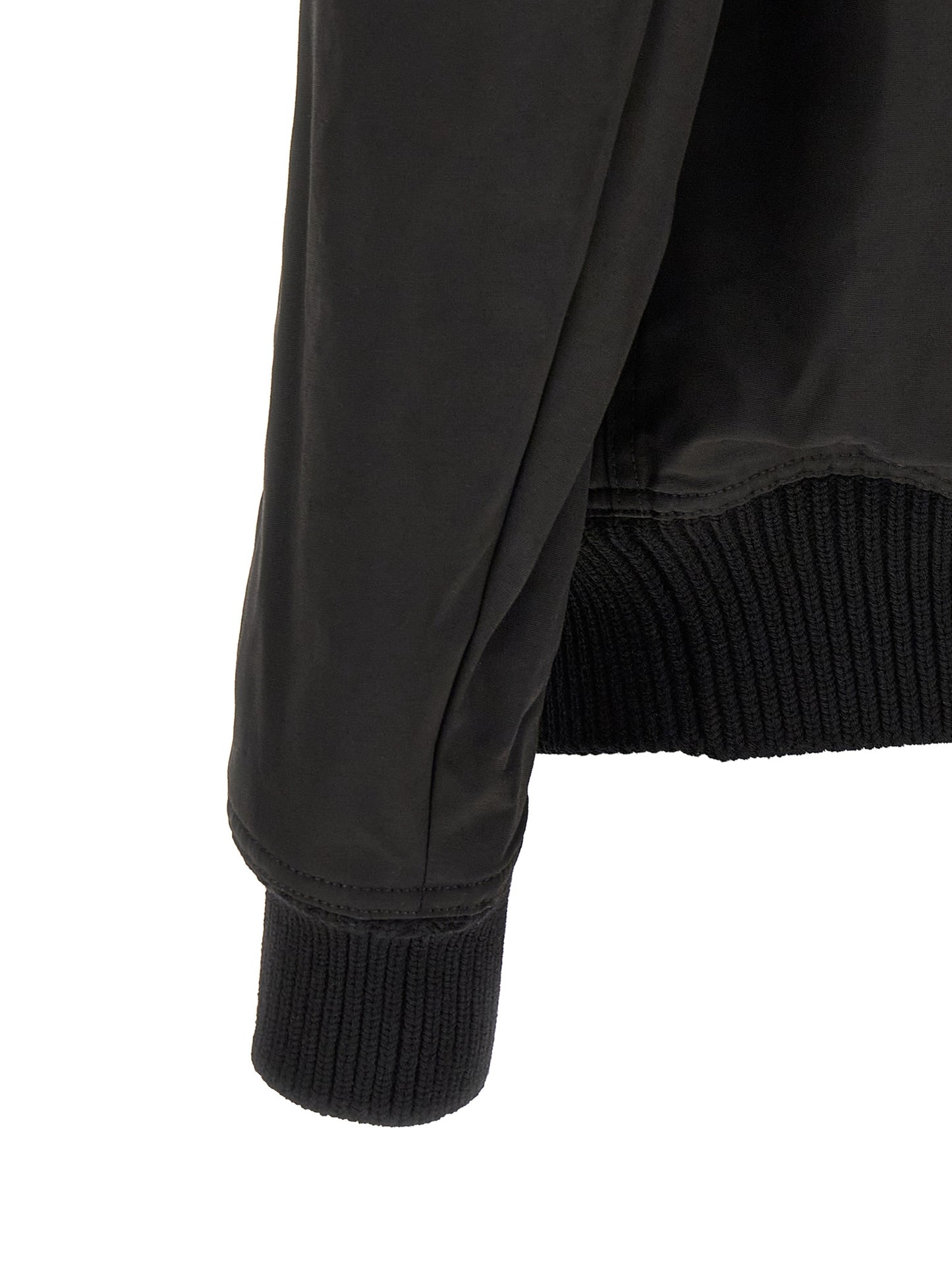 Bomber Jacket by Rick Owens for men in nylon & cotton black & silver features a dramatic silhouette, showcasing a sophisticated and distinctive pockets for a dramatic aesthetic.