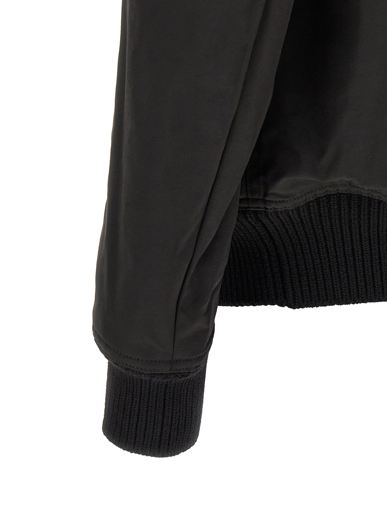 Bomber Jacket by Rick Owens for men in nylon & cotton black & silver features a dramatic silhouette, showcasing a sophisticated and distinctive pockets for a dramatic aesthetic.