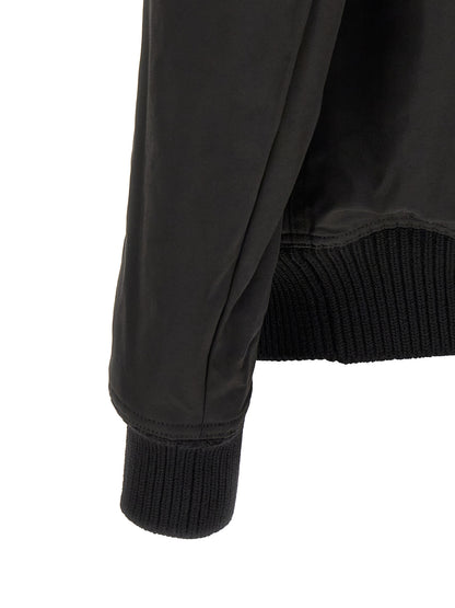 Bomber Jacket by Rick Owens for men in nylon & cotton black & silver features a dramatic silhouette, showcasing a sophisticated and distinctive pockets for a dramatic aesthetic.