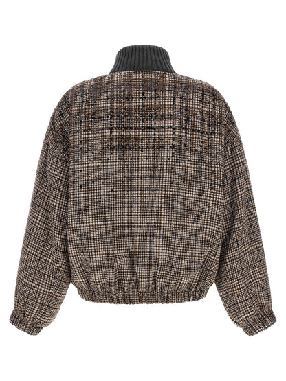 This Bomber Jacket by Brunello Cucinelli for women in polyamide leather alpaca wool & sequins brown & patterned exhibits a edgy silhouette, meticulously detailed with functional pockets and a edgy high-neck neckline for a edgy finish.