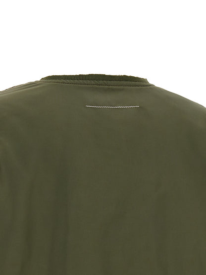 Bomber Jacket by MM6 Maison Margiela for women in polyamide bicolour, green, olive, orange, white & signature features an contemporary silhouette, showcasing a sophisticated and contemporary for a truly refined look.