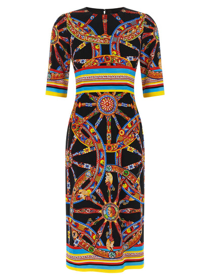 Dress by Dolce & Gabbana for women in silk black, multicolor, print & striped features an cute silhouette, detailed with a three-quarter-sleeve and round neckline that elegantly flows into a cute midi.