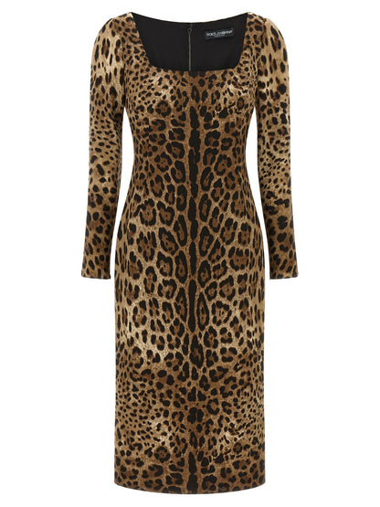 Dress by Dolce & Gabbana for women in stretch viscose animal, brown & print features an sultry silhouette defined by a square neckline and long-sleeve, falling to an sultry midi for a sultry look.