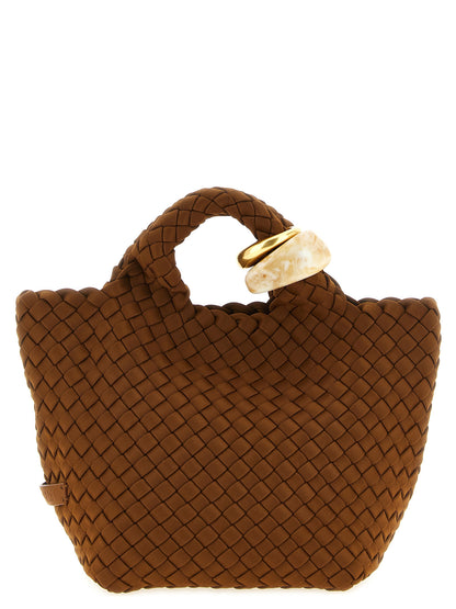 This Small Clutch Handbag by NAGHEDI for women in leather & neoprene and brown presents a sculptural silhouette featuring a secure , ample , and versatile shoulder-strap & handle for a sculptural finish.