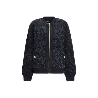 Bomber Jacket by Balmain for women in merino wool nylon polyester cotton & lyocell black features an contemporary silhouette, showcasing a sophisticated and contemporary pockets for a truly refined look.