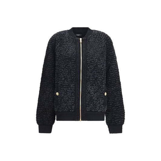 Bomber Jacket by Balmain for women in merino wool nylon polyester cotton & lyocell black features an contemporary silhouette, showcasing a sophisticated and contemporary pockets for a truly refined look.