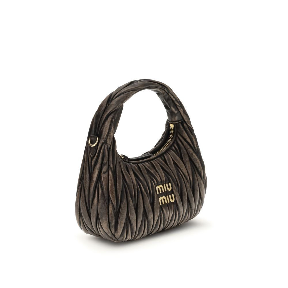 Quilted Shoulder Bag by Miu Miu for women in lamb leather & cotton brown & signature features a effortless chic silhouette with a secure zipper, ample , and versatile shoulder-strap & handle for a effortless chic finish.