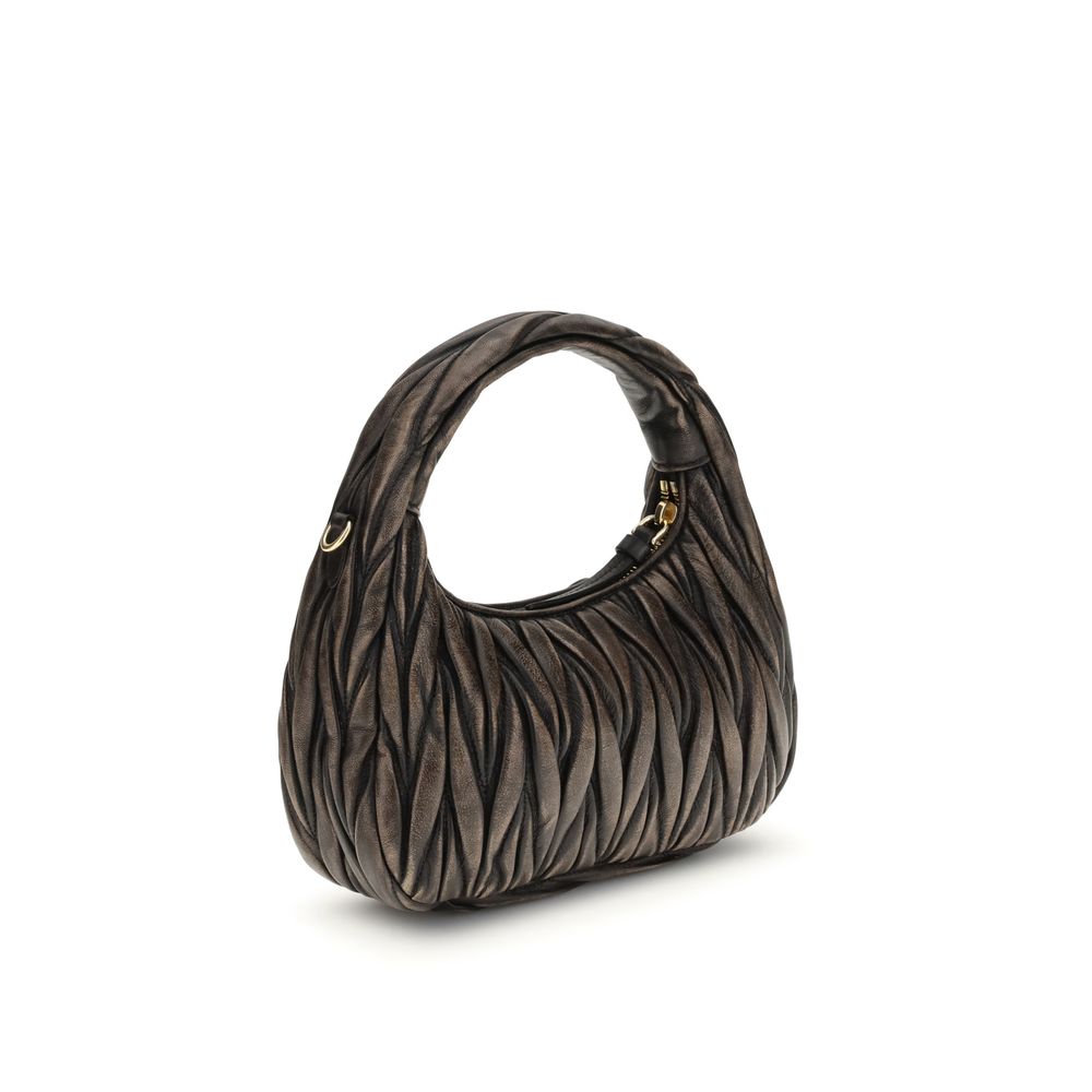 Quilted Shoulder Bag by Miu Miu for women in lamb leather & cotton brown & signature features a enviable silhouette, showcasing a secure zipper, ample , and enviable shoulder-strap & handle for a enviable finish.
