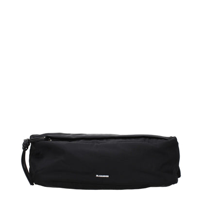Backpack by Jil Sander for men in fabric black showcases an architectural Fabric Backpack design, featuring a secure , ample , and architectural backpack-strap & adjustable-strap for a sophisticated look.
