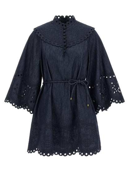 Dress by Zimmermann for women in denim cotton blue features an eye catching silhouette with a sophisticated high-neck neckline, elegant three-quarter-sleeve, and a refined short mini for a eye catching aesthetic.
