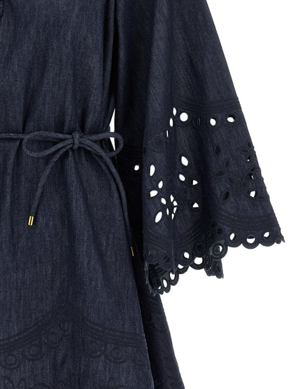 Dress by Zimmermann for women in denim cotton blue features an eye catching silhouette with a sophisticated , elegant , and a refined short mini for a eye catching aesthetic.