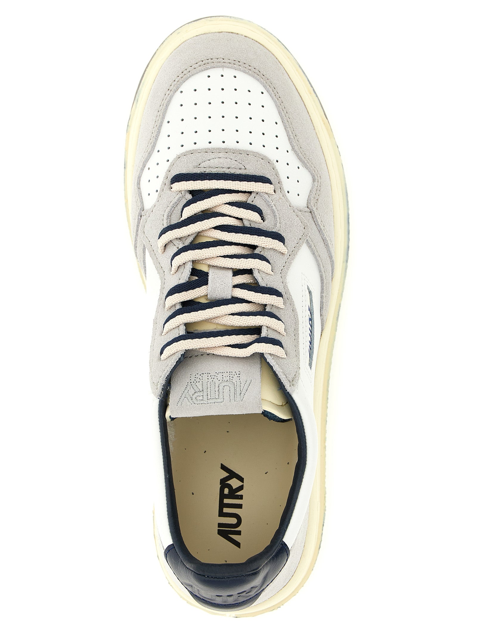Athletic Sneakers by Autry for men in cotton & cowhide suede leather multicolor & navy features an timeless silhouette from the Men's Low Top Cotton & Cowhide Suede Leather Athletic Sneakers collection, showcasing a timeless low-top style for a timeless look.