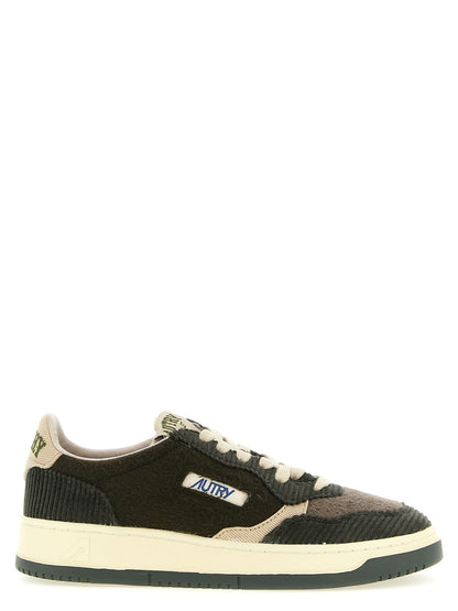 Sneakers by Autry for men in velvet textile corduroy brown, green & olive presents a impeccable silhouette as Men's Low Top Tennis Velvet Textile Corduroy Sneakers, expertly defined by a impeccable low-top tennis style for a impeccable, high-fashion look.