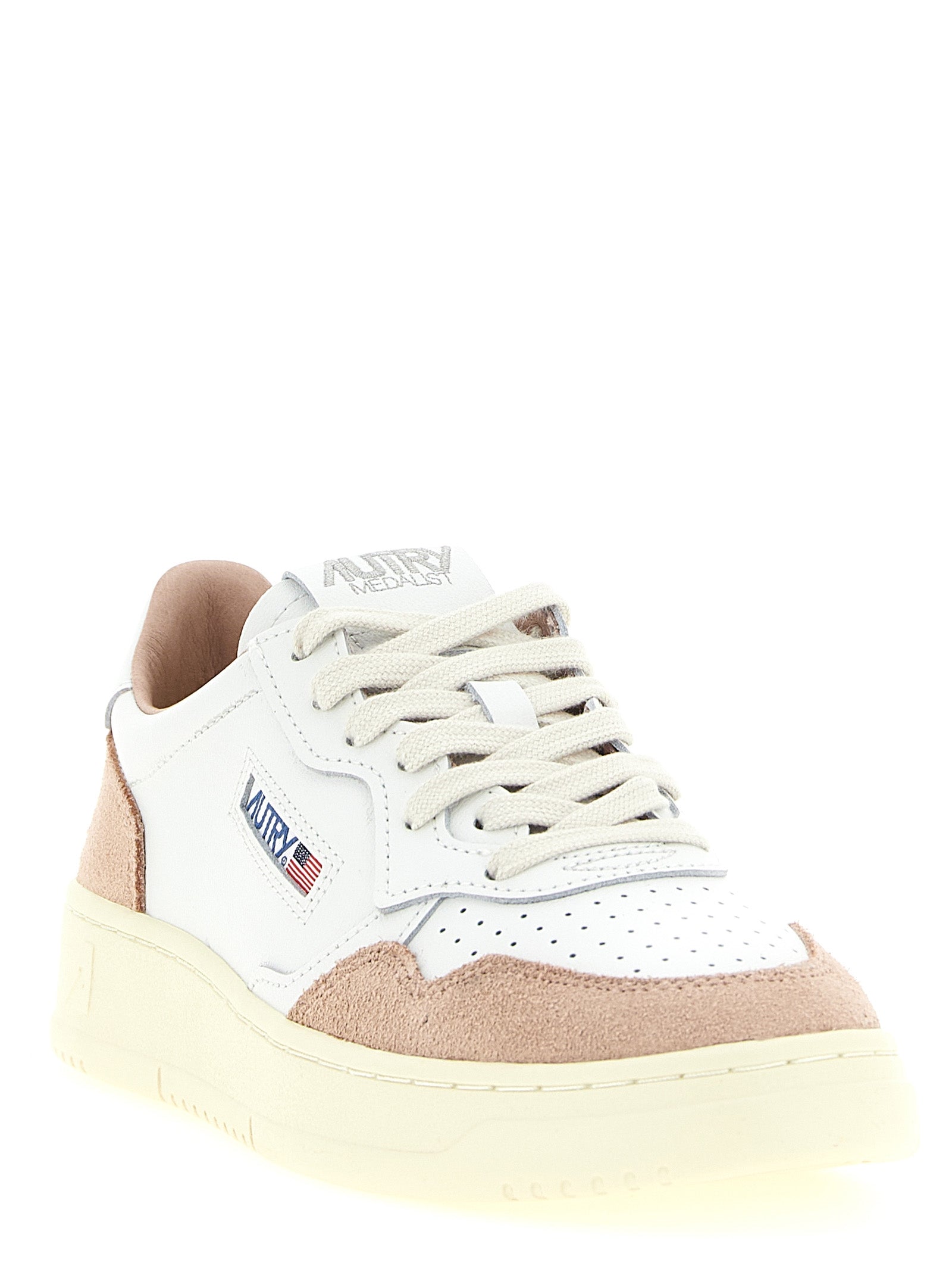 Sneakers by Autry for women in cowhide suede leather multicolor, pink & white presents a on trend silhouette from the Women's Low Top Cowhide Suede Leather Sneakers collection, showcasing a on trend low-top style for an elevated aesthetic.