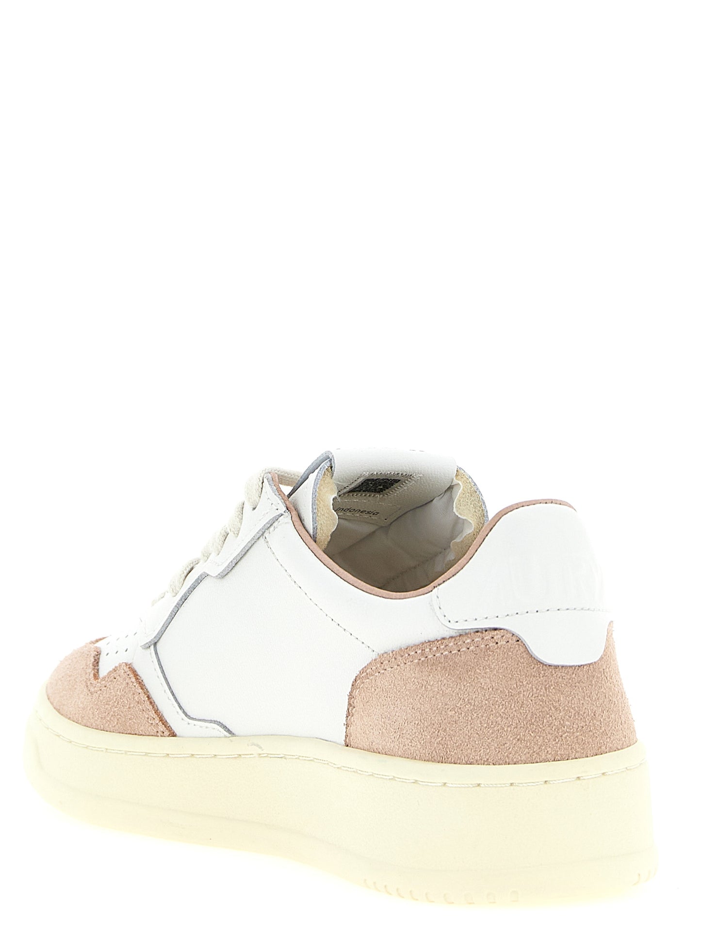 Sneakers by Autry for women in cowhide suede leather multicolor, pink & white features an fashionable silhouette, showcasing the premium Women's Low Top Cowhide Suede Leather Sneakers in a fashionable low-top style that offers a fashionable finish for refined style.