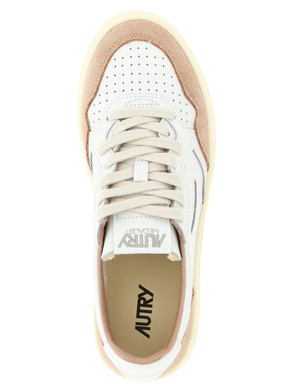 Sneakers by Autry for women in cowhide suede leather multicolor, pink & white features an versatile design from the Women's Low Top Cowhide Suede Leather Sneakers collection, highlighting a versatile low-top style for a premium, high-fashion look.