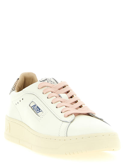 Sneakers by Autry for women in cowhide python leather multicolor & pink presents a on trend silhouette from the Women's Low Top Cowhide Python Leather Sneakers collection, showcasing a on trend low-top style for an elevated aesthetic.