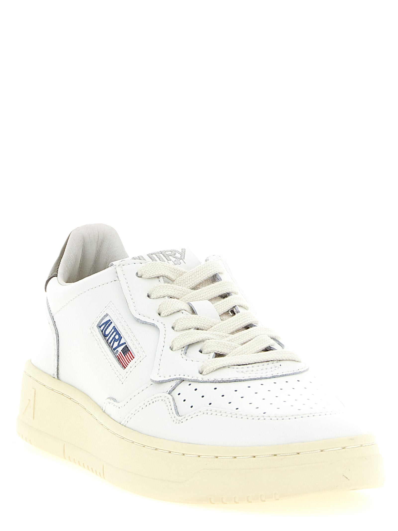 Sneakers by Autry for women in cotton & cowhide leather bicolour, cream, green, white & signature presents a sumptuous silhouette, artfully capturing the essence of the Women's Low Top Cotton & Cowhide Leather Sneakers with its sumptuous low-top style design.