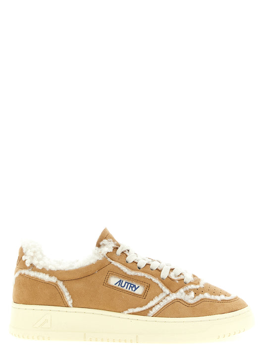 Sneakers by Autry for women in suede lambskin leather brown & camel presents a impeccable silhouette as Women's Low Top Suede Lambskin Leather Sneakers, expertly defined by a impeccable low-top style for a impeccable, high-fashion look.