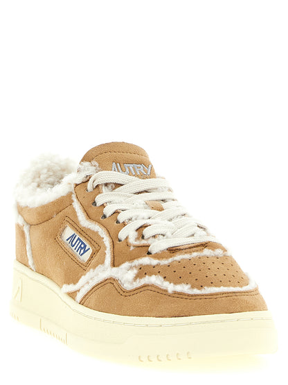 Sneakers by Autry for women in suede lambskin leather brown & camel features an timeless silhouette from the Women's Low Top Suede Lambskin Leather Sneakers collection, showcasing a signature low-top style with an timeless finish.