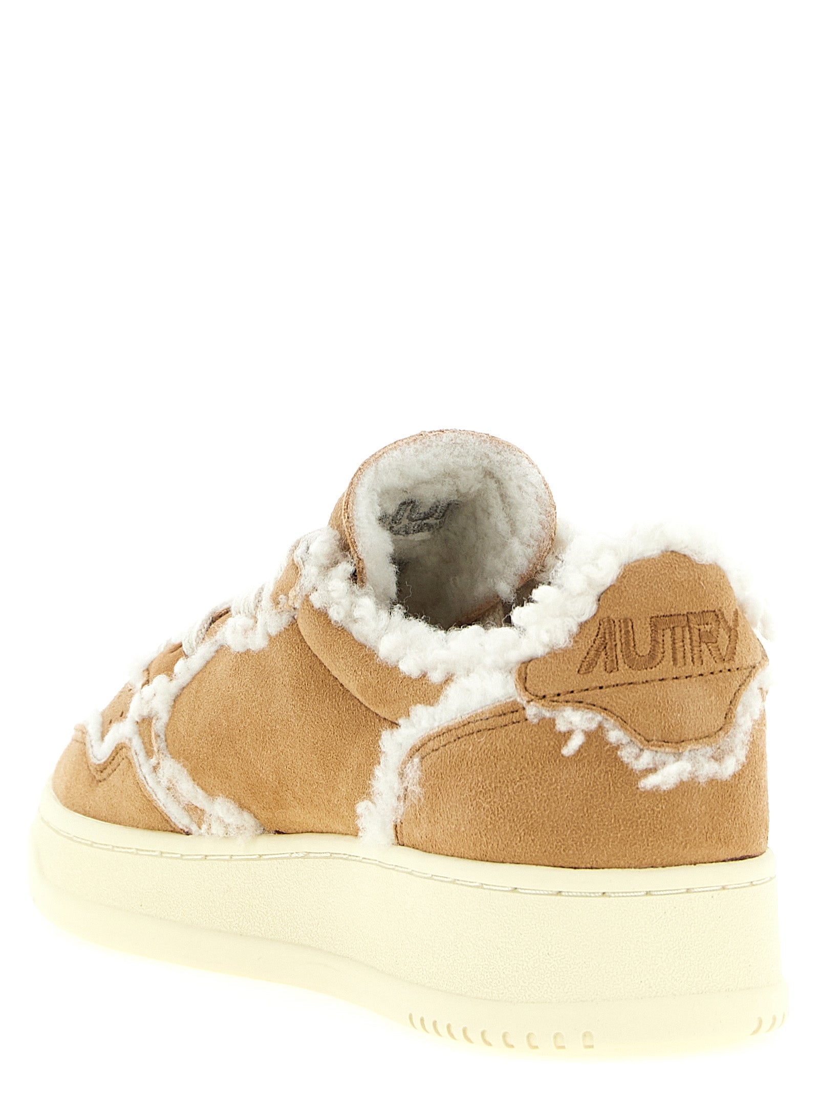 Sneakers by Autry for women in suede lambskin leather brown & camel features an fashionable silhouette, showcasing the premium Women's Low Top Suede Lambskin Leather Sneakers in a fashionable low-top style that offers a fashionable finish for refined style.