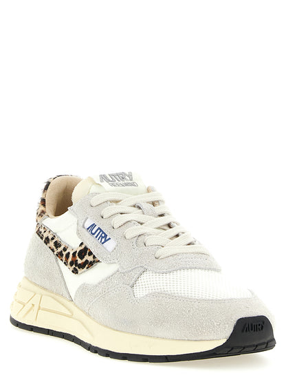 Athletic Sneakers by Autry for women in nylon suede leather & mesh animal, multicolor, signature & print presents a sleek silhouette, perfectly capturing the athletic style essence of Pony Women's Athletic Nylon Suede Leather & Mesh Sneakers with its sleek design and premium finish.
