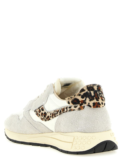 Athletic Sneakers by Autry for women in nylon suede leather & mesh animal, multicolor, signature & print presents a sleek silhouette, perfectly capturing the athletic style essence of Pony Women's Athletic Nylon Suede Leather & Mesh Sneakers with its sleek design and premium finish.