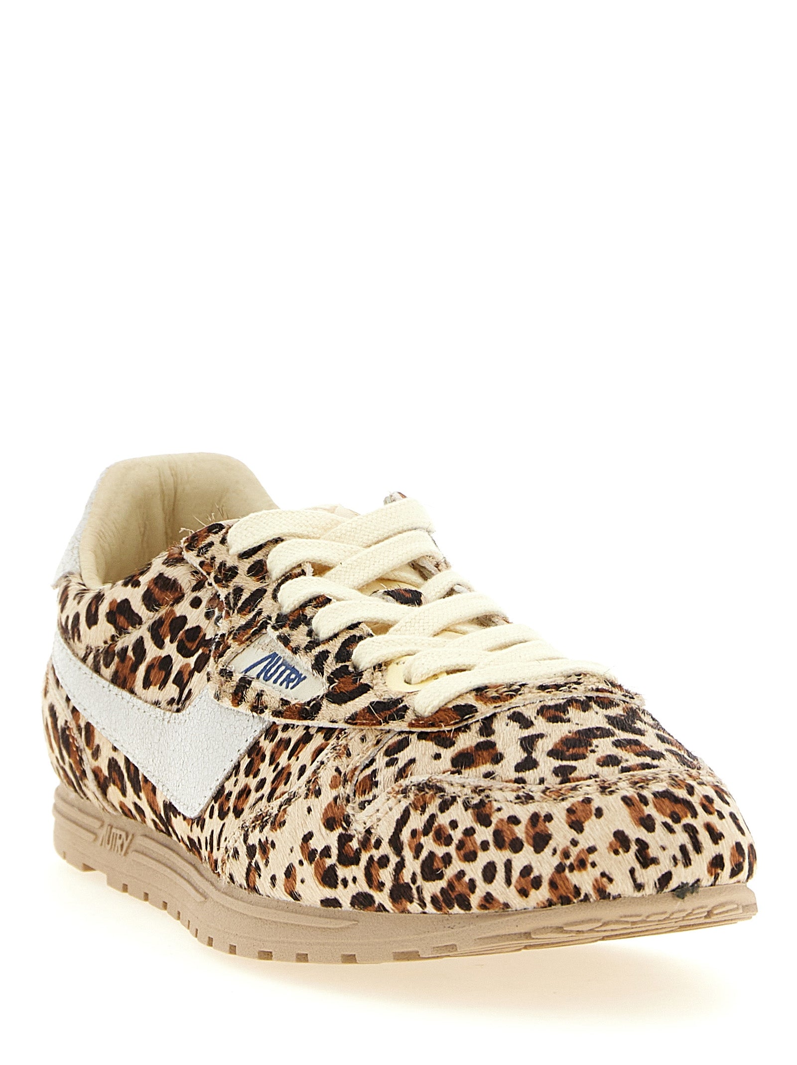 Sneakers by Autry for women in bos taurus cowhide leather gold, multicolor & print features an timeless silhouette from the Pony Women's Low Top Bos Taurus Cowhide Leather Sneakers collection, showcasing a signature low-top style with an timeless finish.