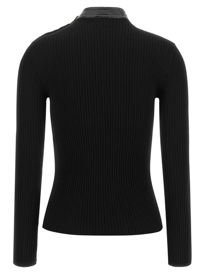Cardigan by Courrèges for women in acetate vinyl & viscose black presents a textural silhouette, artfully finished with a textural high-collar neckline and for a sophisticated, textural look.