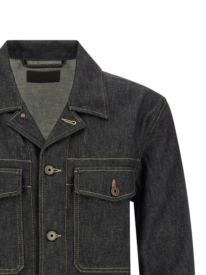 This Trucker Jacket by Lemaire for men in denim cotton blue exhibits a edgy silhouette, meticulously detailed with functional pockets and a edgy for a edgy finish.